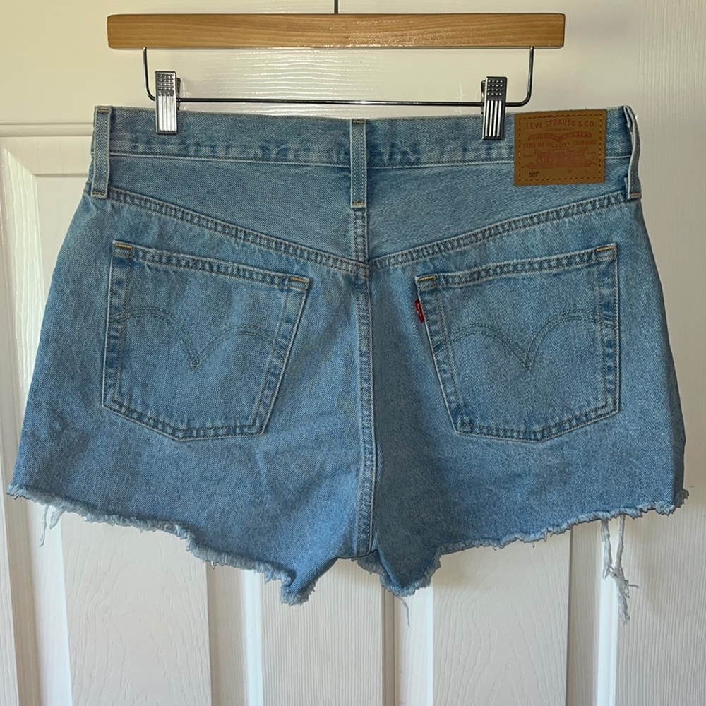 New Levi denim shorts with tags, size 31.